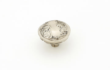 Schaub Cantata Round Knob - Scrolled designs with Petals on base in Polished White Brass